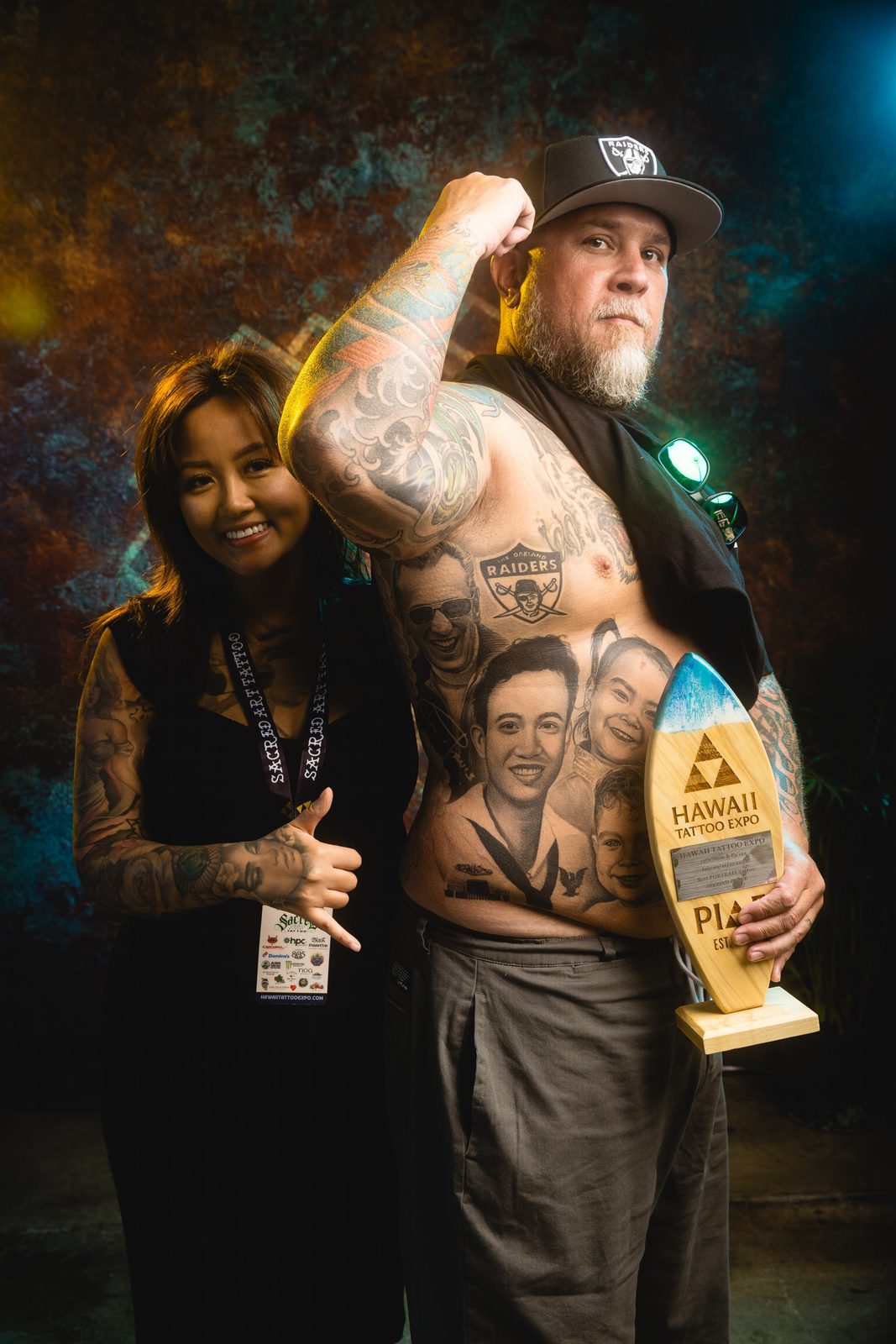 Lynn Hoang with her client at the Hawaii Tattoo Expo
